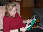 Melodie reading my new plant book from Phil