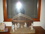 This one was attempting to create a star over the Nativity scene.  (Notice the finished gingerbread house, too -- especially the snow-covered Tootsie Roll log pile!)