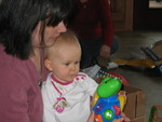 Dina and Brianna with her musical turtle from Grandma Carolyn