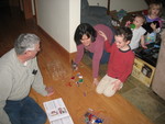 PaChris, Dina, and Connor, with Bella and Roiya in the background