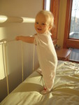Brianna can't get enough of holding onto things and standing up!