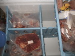 Partially loaded freezer with room left for new meat on the way