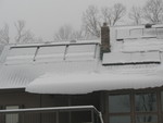 Amazingly, the solar panels still produced electricity under all this snow!  (Only enough to power a 40-watt bulb, though.)