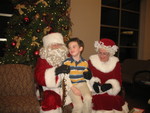 December 21: Connor visiting with Santa and Mrs. Claus at the Surgery Center