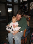 Daddy helping Brianna investigate her stocking