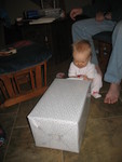 Brianna opening her first present