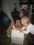 Grandpa put the blocks back in, so Brianna took them back out