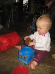She was having so much fun with it she didn't really want to stop playing with it to unwrap anything else!