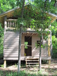 May 23: Finally remembering to take pics of the nearly-complete playhouse!  Front porch
