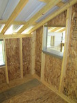 Upstairs from another angle. The window on the left looks out toward the playhouse; the one on the right opens onto the deck.