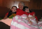 Aunt Ruth and the kids with the blankets she gave them