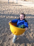 Another innovative playground ride -- like a cup balanced off-center. C very quickly learned how to shift his weight to keep spinning constantly