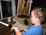 Connor 'driving' the tugboat at the Science Museum