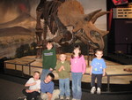 Victoria's kids with my kids in front of Triceratops.  Left to right: Ben, Josiah (standing), Lawrence, Xavier, Kailyn, and Connor. 