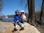 Kids posing on a boulder (one of many in the park, deposited by glaciers)