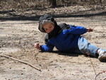 Connor wasn't half as interested in the Mississippi River as in the sand on the trail
