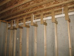 They framed a soffit around the rainwater pipe