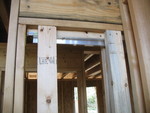 The hangers for the pocket doors are now installed