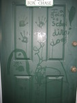 She decorated our front door while waiting for time to leave