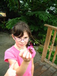 Kailyn coaxed Connor's butterfly onto a flower