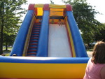 August 23: Fall Kickoff party.  Connor on the inflatable slide