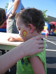 Getting his face painted