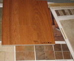 Other colors of Montara with wood sample. Left to right: Sand Dune, Gold Coast, Red Rock, Red Rock 
