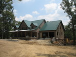 August 1: Driveway view of the house