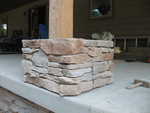 Levi has been working on the stone bases for the porch posts the last few days