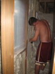 Insulation was carefully sprayed even in less-obvious locations -- like behind the shower