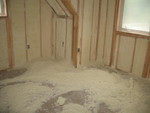 'Snowdrift' of fine insulation shreds in Connor's room