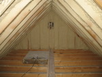 Attic insulation (the thing on the end is the gable vent)
