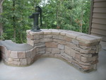 Levi finished the stonework today. Finished bench