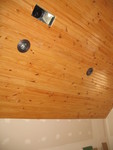 Loft ceiling with can light trim installed