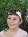 She insisted on wearing this butterfly-print headband to the aquarium because she was sure it'd attract butterflies. She was right! This one landed right on it!