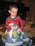 Connor with his lovely new quilt from Great-Grandma Mary