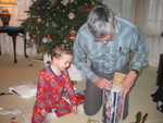 Grandpa helps him open his fire truck. Jean and Drew bought it for him in PA and shipped it to us -- we don't have Hess stations in KY!