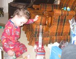 After he lined them up on the chair arm, he rescued them with the fire truck ladder
