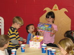 With Devin and Trevor (on the left), opening their gift