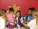 With Celeste, who gave her a purse with a K on it and some fun things to put in the purse