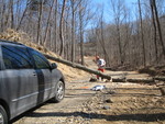 Here's what daddy was doing while we were finding geodes: clearing the very first (but no doubt not the last) tree to fall across our driveway