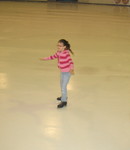 Practicing skating like the older kids, with arms out