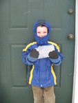 February 6: Another cold day! Connor with a huge, thick icicle he and Kailyn found. They both call it 