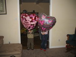 February 15: Connor and Kailyn with their Valentine's Day balloons, nearly as big as they are!