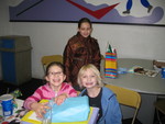 Kailyn about to open her gift from Audra (Gela in the background)