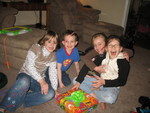 Back at our house -- getting ready to open her present from us