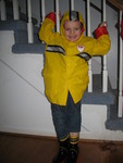 February 28: Connor loves his new fireman rain jacket and boots!