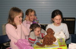 Tori warned all of the kids to cover their ears before K opened the next gift