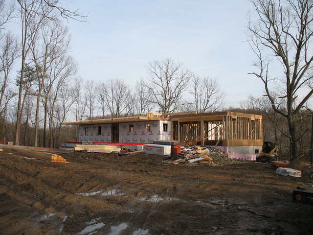 February 28: upstairs floor is on, and the garage is framed and ceilinged