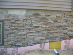 Another stonework pic: far right end, including the area around the spigot